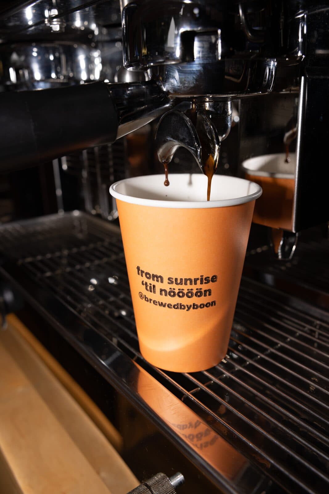 espresso into branded cup